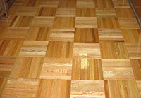 Pavimento in legno trama a scacchiera